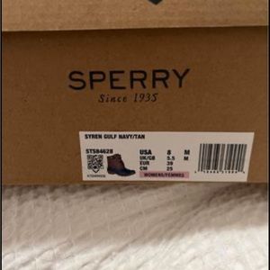 Sperry rain boots.